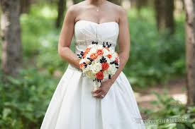 Navy blue has been a hot wedding color for the past few years and still will be a trendy wedding color for 2017. Rustic Orange Navy Blue Wedding Flowers Buffalo Wedding Event Flowers By Lipinoga Florist