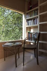 Garden home community library's mission is to build community by connecting you to resources in april 2019, the library expanded from 1,996 to 3,449 square feet, thanks to support from the. Gallery Of Garden Library Mjolk Architekti 8 Home Tree House Home Library