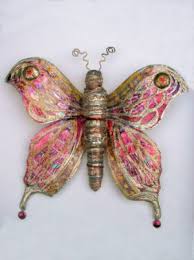 VAL Hunt of ArtHunt a creative recycling artist producing Sculptures, Wall  Hangings, Jewellery and Hats from drink cans and selected rubbish.