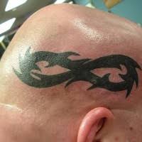 You can also check out the buddhist infinity tattoos. Tribal Infinity Symbol On Head Tattooimages Biz
