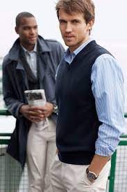 A Sweater Vest Layered Over A Collared Shirt Makes For A Great Business Cas Business Casual Attire For Men Business Casual Looks For Men Business Casual Attire
