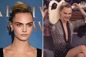 WATCH: Cara Delevingne can play the guitar PERFECTLY behind her head