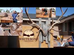 Using a 3/16 inch drill bit, finish drilling 3 of the predrilled holes through the plaque. How To Mount Shed Antlers Diy Youtube