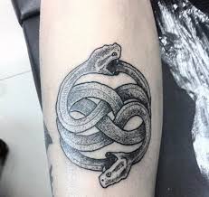 It is a long serpent twisted around itself. Top 73 Ouroboros Tattoo Ideas 2021 Inspiration Guide