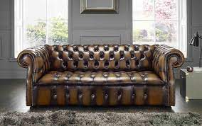 Removable, round tapered legs feature an espresso finish. A Chesterfield Sofa For A Small Space British Chesterfield Sofas