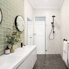 Amber Tiles Kellyville Pinned From Love It Or List It Australia Loveitorlistitau On Instagram Lo Bathroom Feature Wall Feature Tiles Round Mirror Bathroom