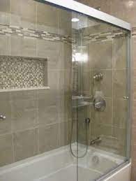A beautiful bathroom tile design can transform a plain space into a standout sanctuary. Love This Tub Tile Accents And Doors This Would Work For Your Bathroom Window Would Be Wher Small Bathroom Remodel Bathroom Makeover Bathroom Shower Tile