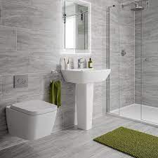 Although tiles are very functional, reliable, easy to wash and clean and they look cool, most bathrooms are clad with tiles. Arctic Grey Marble Effect Matt Wall And Floor Tile 300mm X 600mm Victoriaplum Com Bathroom Tile Designs Grey Bathroom Tiles Bathroom Design