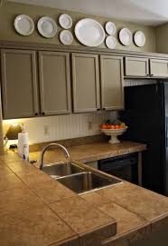 Plates Decoration Ideas For Kitchen Walls Decorideaz Com Kitchen Soffit Kitchen Cabinets Decor Above Kitchen Cabinets