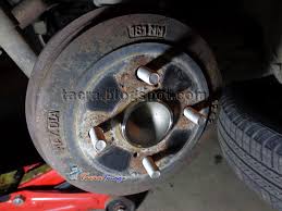 (1) back plate (2) retainer (3) spring washer (4) lever (5) parking brake shoe (primary) (6) parking brake show (secondary) (7) strut spring. Tacra S Diy Garage Myvi Rear Wheel Bearing