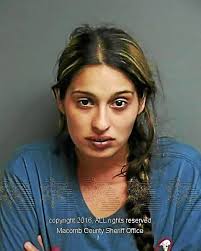 Pair charged in scam of elderly Clinton Township man