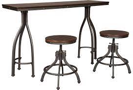 The set includes 6 chairs, meaning that the maximum seat capacity is 6 persons. Ashley Signature Design Odium D284 113 Industrial 3 Piece Rectangular Counter Table Set Dunk Bright Furniture Pub Table And Stool Sets