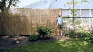 Zillow digs™ in a backyard, a chain link fence can be used to separate your landscaping from your neighbor's yard, keep pets in (or out!) and generally mark the borders of your yard. Installing A Bamboo Friendly Fence On A Chain Link Fence Youtube