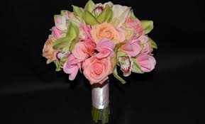 Plan a hawaiian style wedding & reception with fresh hawaiian flowers, tropical flower bouquets, flowers by the stem, orchid leis, tropical foliage, haku headbands, corsages and boutonnières to create the perfect hawaiian wedding that is as beautiful, memorable, unique and as special as the two of you are. Hawaiian Bridal Bouquet Using Real Touch Flowers Destination Or Not