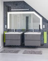 The entire bathroom was designed around the sloped ceiling, which is a striking architectural feature. Mirror Amene 2 Led Sloping Ceiling Mirror For You