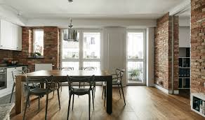 Drilling through a brick wall requires preparation and skill. Exposed Brick Walls In Revamped Krakow Flat