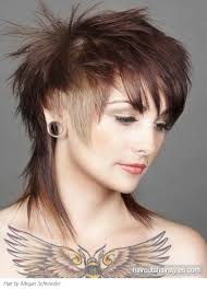It's punk and pretty all at the same time, and at least you won't need to worry about styling those long braids every day. Punk Hair Styles Punk Hair Punk Haircut Short Punk Hair