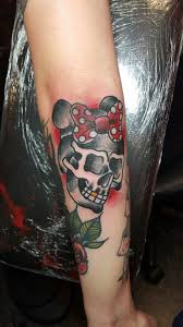Every kid loves minnie mouse very much. Black And Grey Skull With Bow Tattoo On Leg