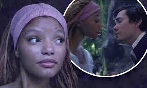 Halle Bailey goes in for a kiss during romantic boat ride with her Prince  Eric in The Little Mermaid