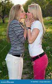 Portrait of Two Playful Kissing Blonde Stock Image - Image of person, cute:  18449565