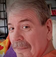 Fake Dolly Parton Facebook Pages and Scam Accounts