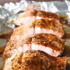 Place the salmon fillets on top of the herbs and lemon then cover with foil or parchment paper. Easy Oven Baked Salmon Filet My Texas Kitchen