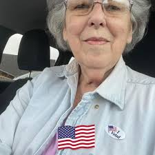 It's a dermal piercing consisting of a flat plate that sits just under the  skin with the jewelry visible above.