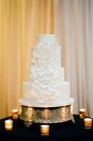 White wedding cake cascading flowers. 25 Timeless Yet Trendy All White Wedding Cakes Weddingomania