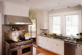 The backsplash can be ordered cut. Stainless Steel Backsplash With Shelf Transitional Kitchen Crown Point Cabinetry