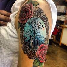 Creepy Cemetery Portrait Tattoo Most Boo Tiful Halloween Tattoos Are Here To Help You Get Ready For The Most Framed Tattoo Mirror Tattoos Vintage Frame Tattoo