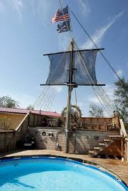 Pirate Ship Next To The Pool With A Plank For The Diving Board And Rigging They Could Climb And Jump Off Of Into The P In Ground Pools Pool Deck Backyard