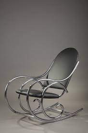 1950s rocking chair in thonet style it is composed of a black leatherette upholstered seat and back with oval to metal furniture rocking chair steel furniture