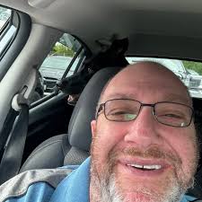 I'm wanting to put a nameless quad tip exhaust but I have curt two inch  receiver is it possible if anyone has done so can I get a picture of  underneath |