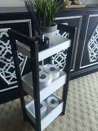 kmart hack toilet caddy painted black and white changes the whole look small bathroom decor kmart decor kmart home