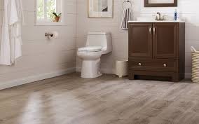 A Well Lit Bathroom With Luxury Vinyl Plank Flooring Luxury Vinyl Plank Flooring Vinyl Plank Flooring Vinyl Plank Flooring Bathroom