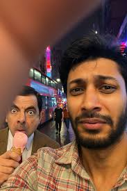 Selfie first before throwing the beans