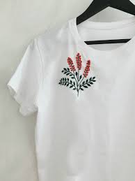 A sleeve tag on a long sleeve is typically reserved for a logo icon and is placed 5 down from the top seam. Embroidery Designs T Shirt Novocom Top