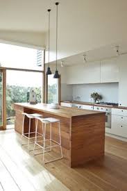 The middle island has a little step that can be used to rest. 150 White Kitchen With Wooden Floor Ideas Kitchen Design Kitchen Inspirations Kitchen Interior