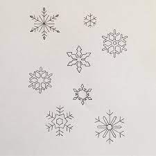 You get a two sets of png files one set of white snowflakes on transparent backgrounds and a set of black chalky snowflakes on transparent backgrounds for you to recolor any way you like. Originaldrawing Drawing Tattoo Tattoos Sketch Contemporarytattooing Snowflakes Snow Winter Blackw Snow Flake Tattoo Snow Tattoo Tiny Snowflake Tattoo