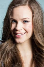 Turns out, everyone — seriously, everyone — has brown eyes. Close Up Of Smiling Woman With Long Brown Hair And Blue Eyes Stock Photo Dissolve