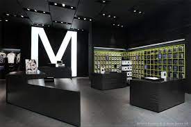 Who is the designer of the black background website? Pin On Stores