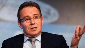 BHP chief executive Andrew Mackenzie heads for the door