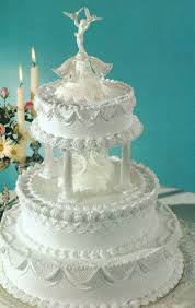 White Buttercream Tiered Cake Wedding Cake Frosting Wedding Cake Buttercream Frosting Cool Wedding Cakes