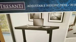 Using a sit/stand desk helps to counteract the negative health effects of a sedentary job. Costco Tresanti Adjustable Height Desk Black Glass 299 Youtube
