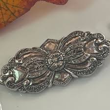 white gold brooch