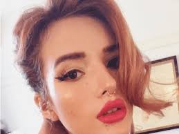 Bella Thorne Gets Matching Foot Tattoos With Dani Thorne