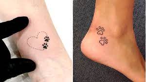 47 Tiny Paw Print Tattoos For Cat And Dog Lovers Tattoos For Dog Lovers Pawprint Tattoo Tiny Tattoos For Women