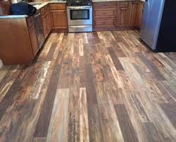 Laminate Wood Flooring In Kitchen Light Medium And Dark Wood Gainey Flooring Solutions Flooring Wood Floors Wide Plank House Flooring
