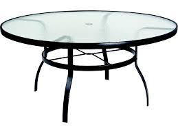 Some tables feature a slot to support a patio umbrella for discreet usage. Woodard Aluminum Deluxe 60 Wide Round Obscure Glass Top Table With Umbrella Hole Wr826360w