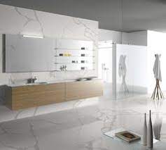 Favorite this post jul 15 drinking fountains Futuristic Kitchen Design Featuring Calacatta Oro Quartz By Teltos Quartz Stone Bathroom Design Futuristic Kitchen Design Upstairs Bathrooms